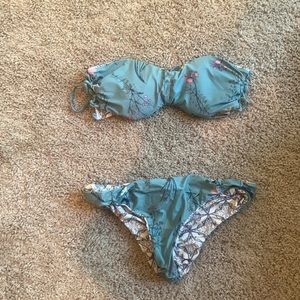 O Neill two piece swim suit. Size medium. Reversible.